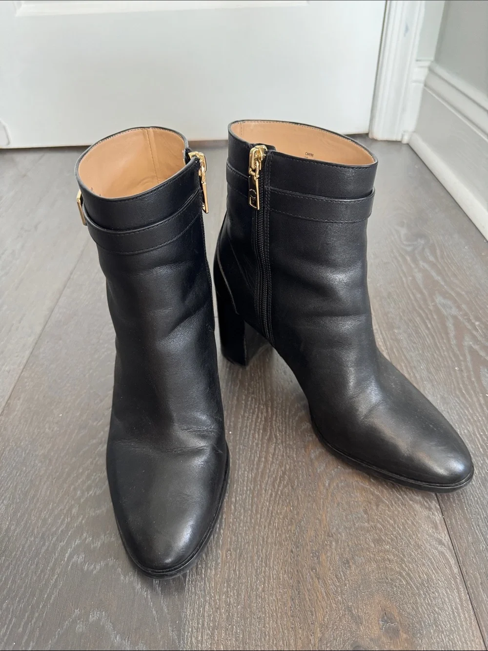 Coach Black Leather Ankle Booties with Gold Trim